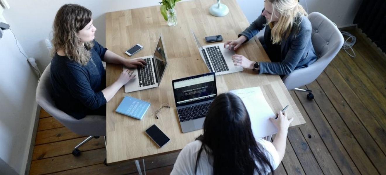 Startup founders working at a desk