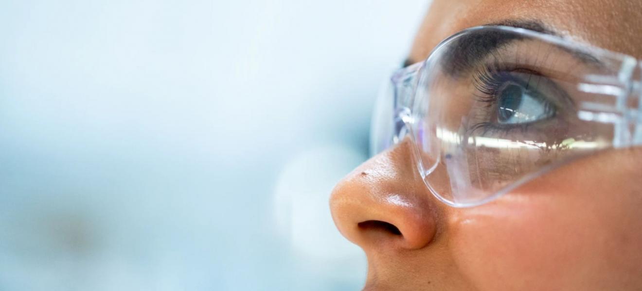 A close-up of a female scientist 