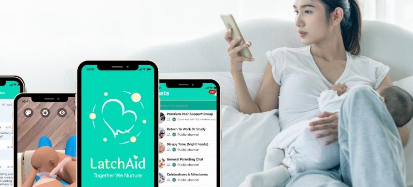 A mother using LatchAid A mother using LatchAid