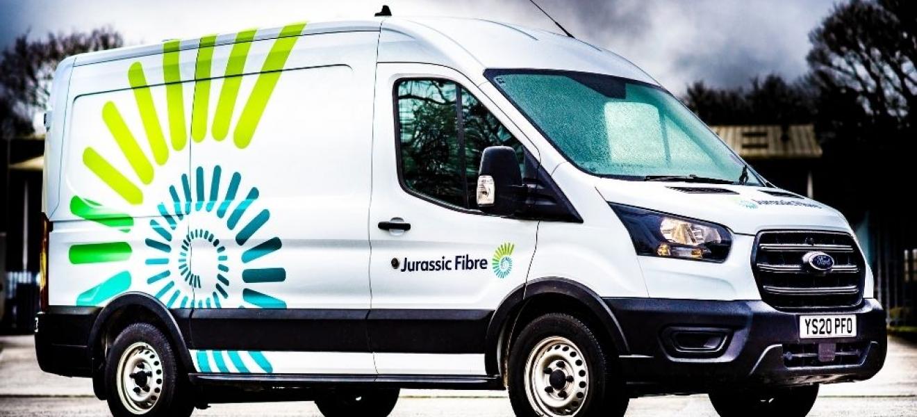 A Ford Transit van branded with Jurassic Fibre livery A Ford Transit van branded with Jurassic Fibre livery