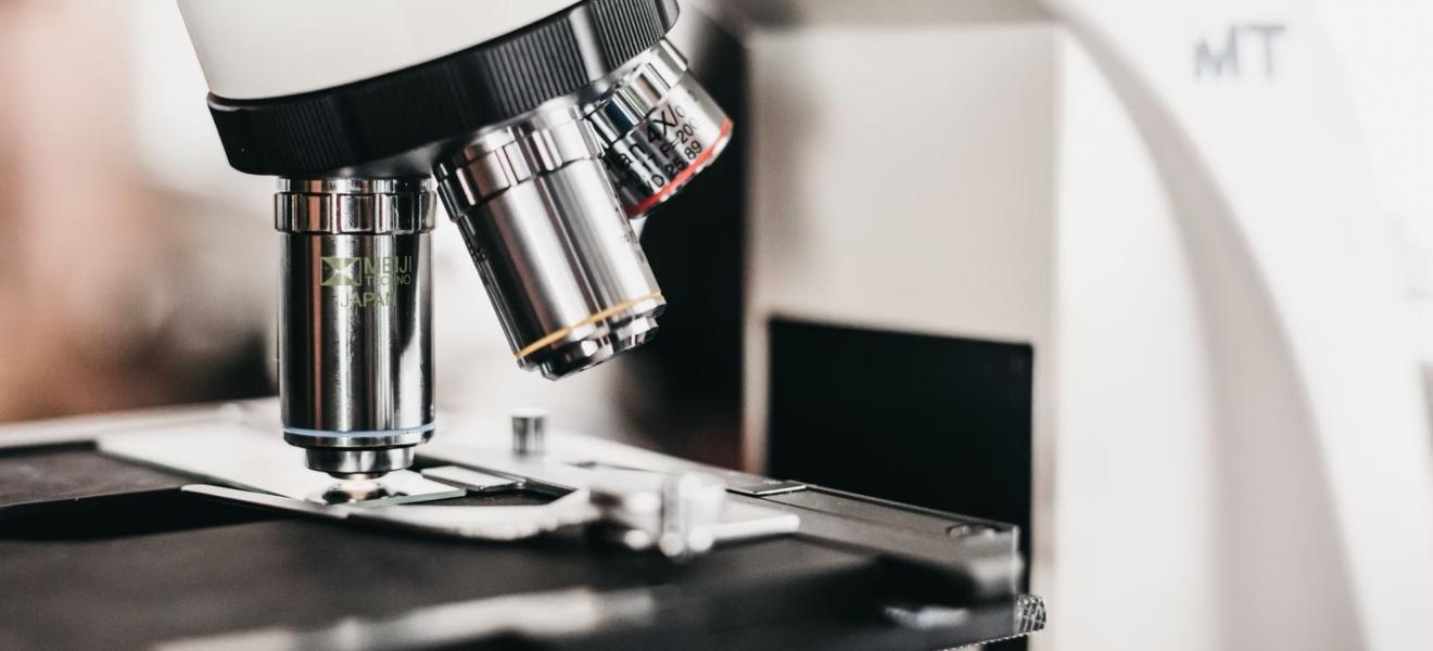 A microscope in a lab A microscope in a lab