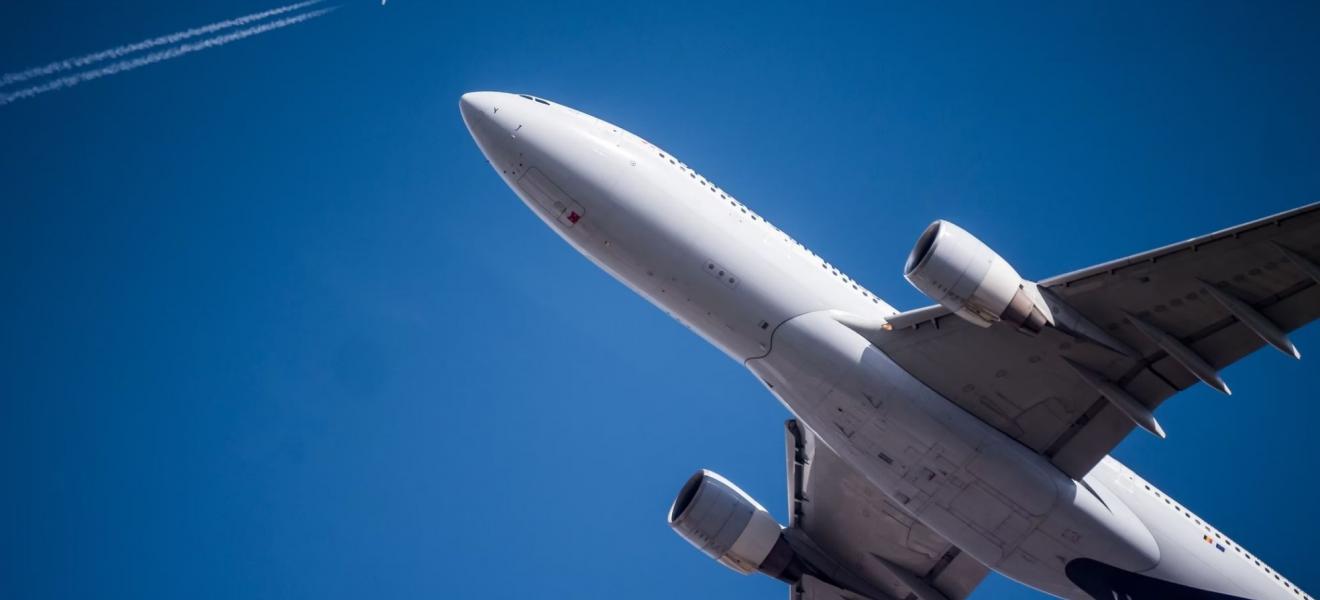 Two aircraft in flight, seen from below