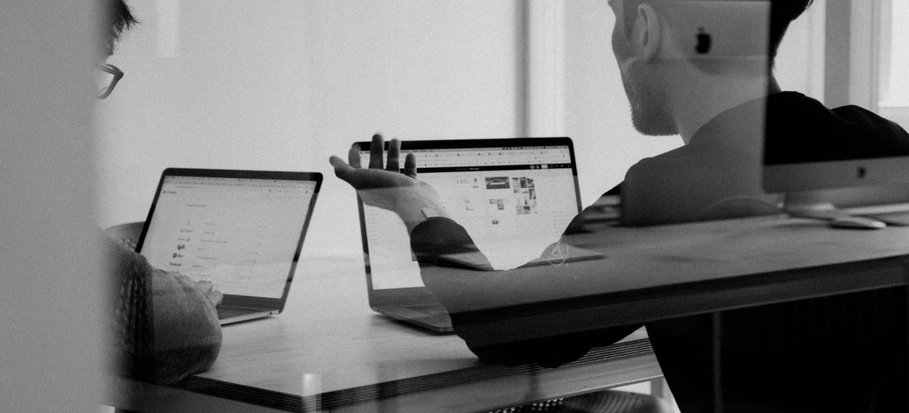 A software developer working at a laptop A software developer working at a laptop