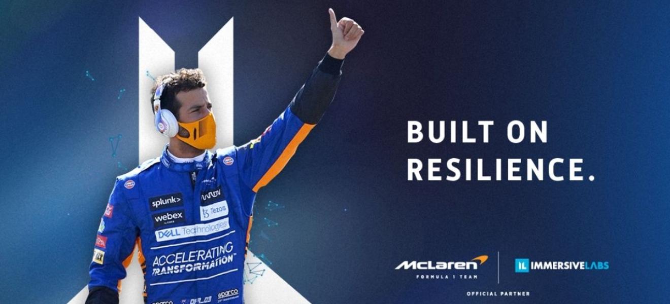 An F1 driver raising his arm in celebration. The text says: 'Built on resilience'