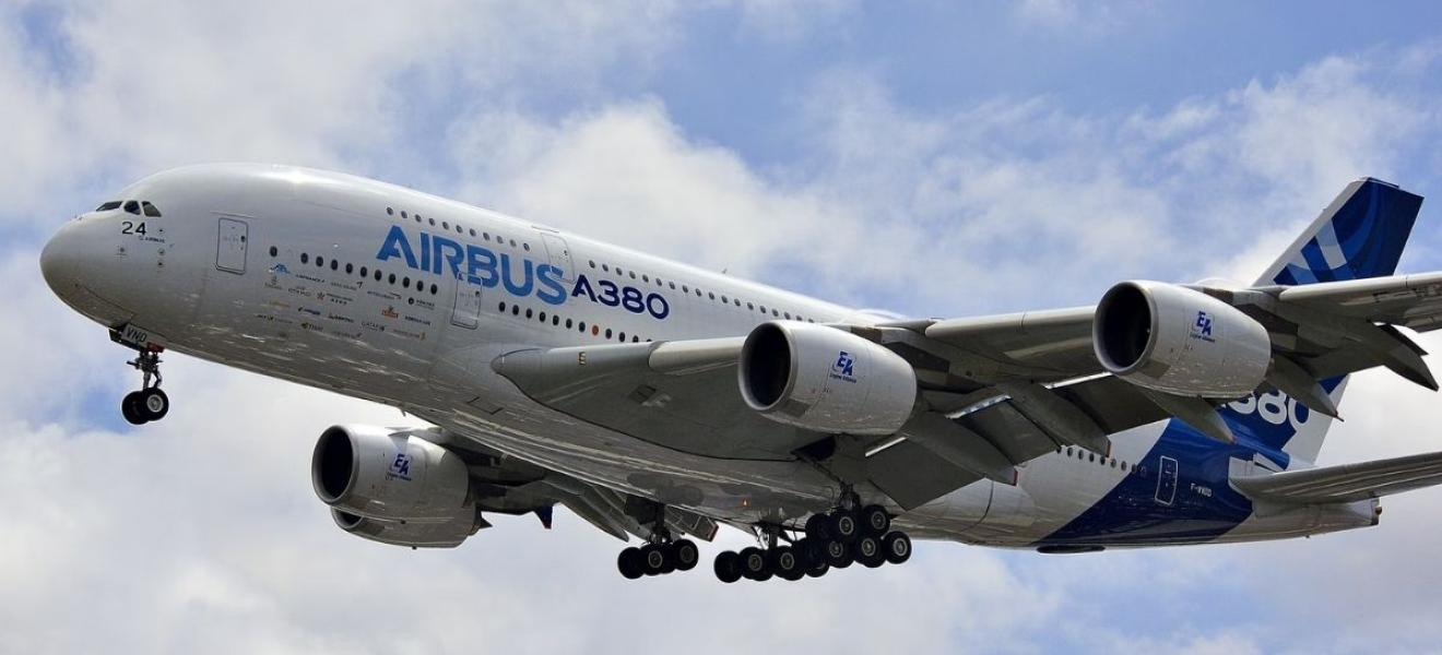 An Airbus A380 with landing gear deployed