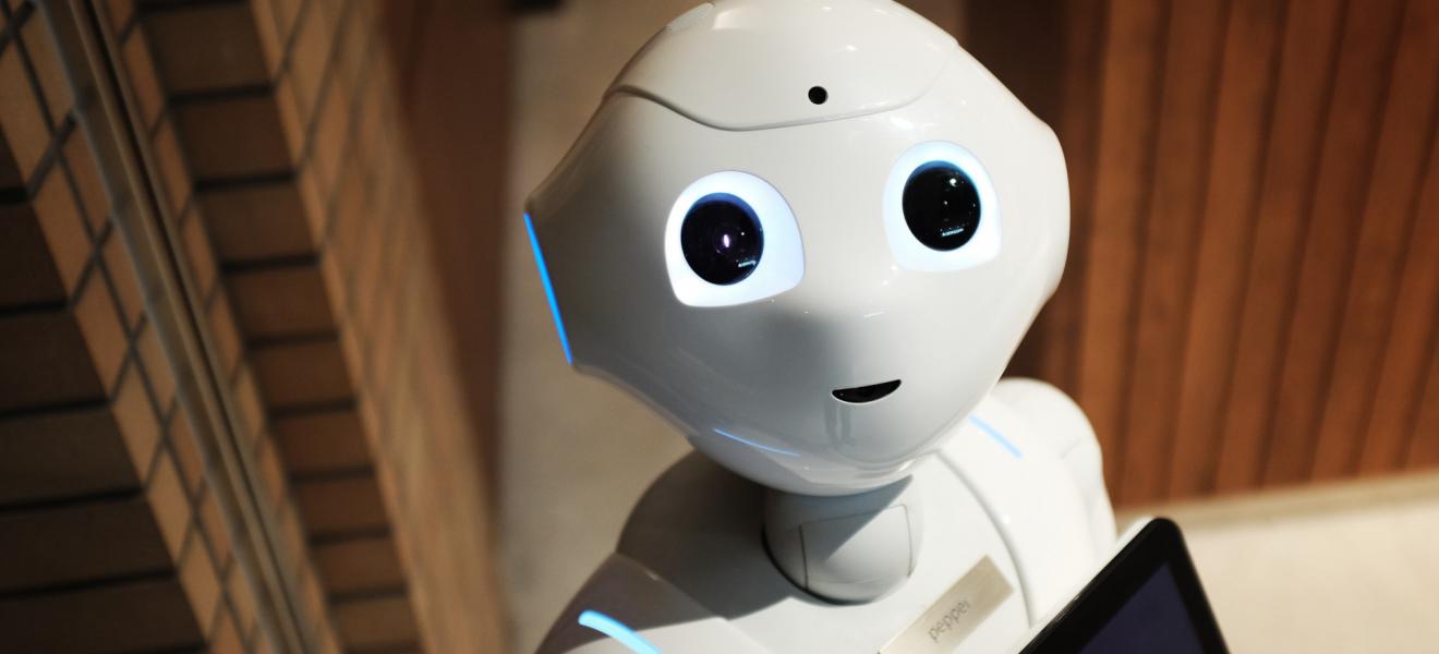 Cute Robot looking up with big eyes