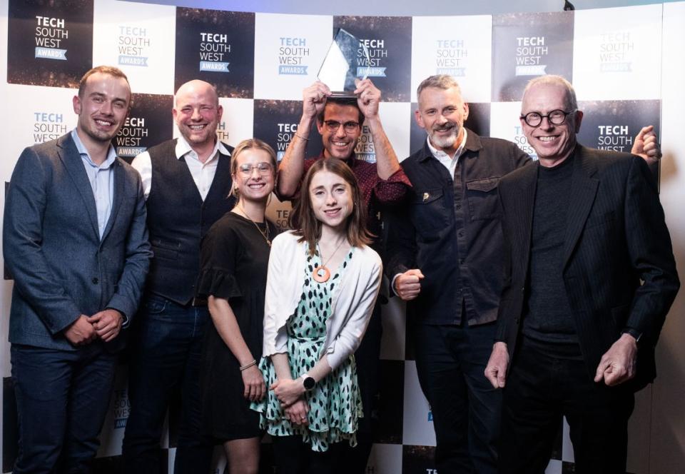 The Kelpi team celebrates at the Winners' Wall