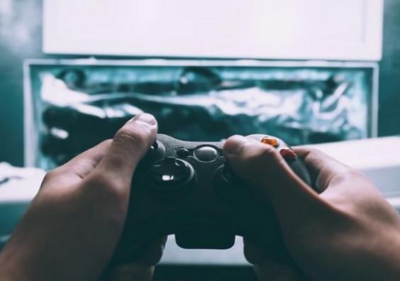A person playing video games A person playing video games