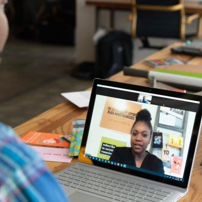 Two people having a conversation via videocall