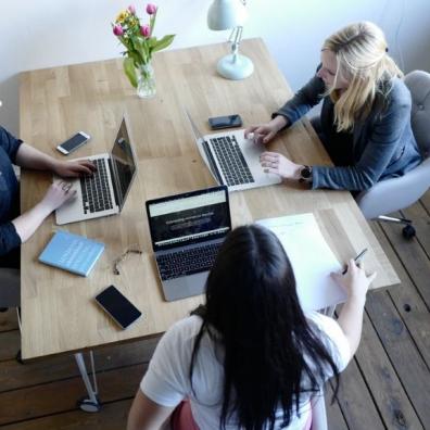 Startup founders working at a desk