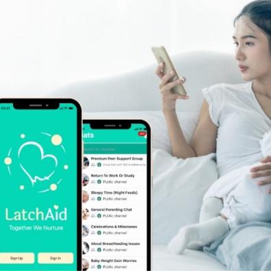 A mother using LatchAid