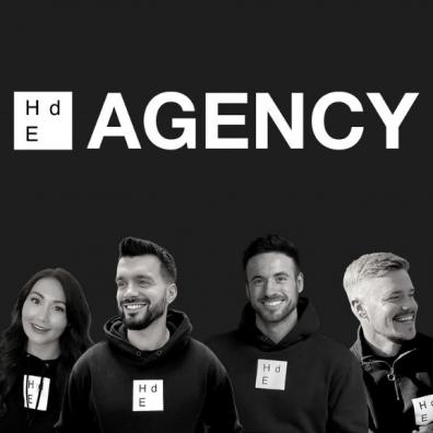 The HdE Agency staff with their logo above