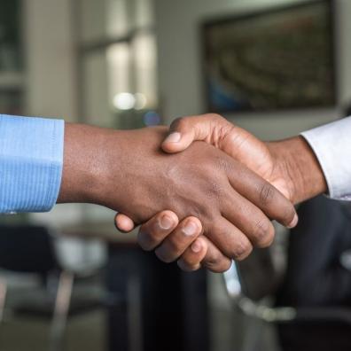 Two people shaking hands