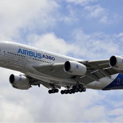 An Airbus A380 with landing gear deployed