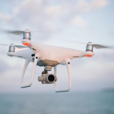 A drone flying over the sea